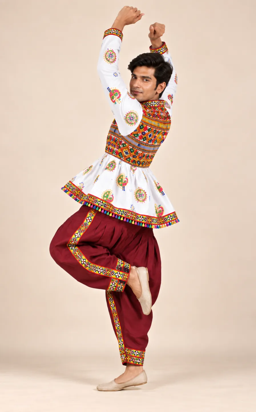 White Printed Kediyu with Maroon Pants — dance pose