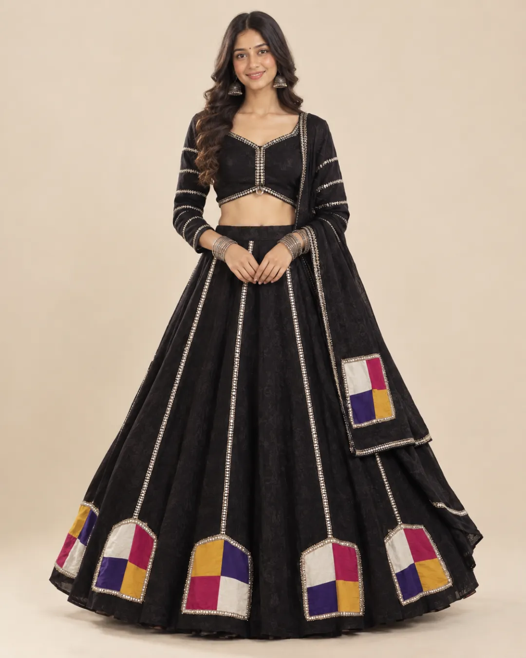 Black Lehenga with Four-Colour Patchwork and Gota Trim — front view of the gota seams and patchwork hem