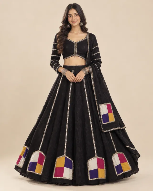 Black Lehenga with Four-Colour Patchwork and Gota Trim — front view of the gota seams and patchwork hem