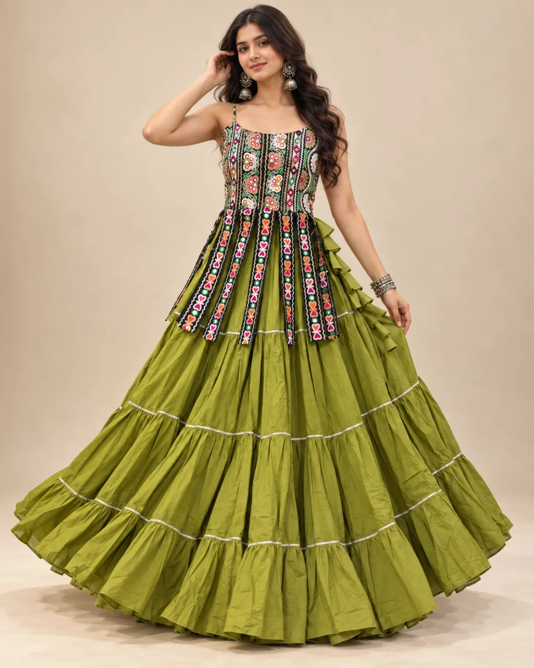 Mehendi Green Tiered Dress with Embroidered Overlay — front view of the embroidered bodice and tiers