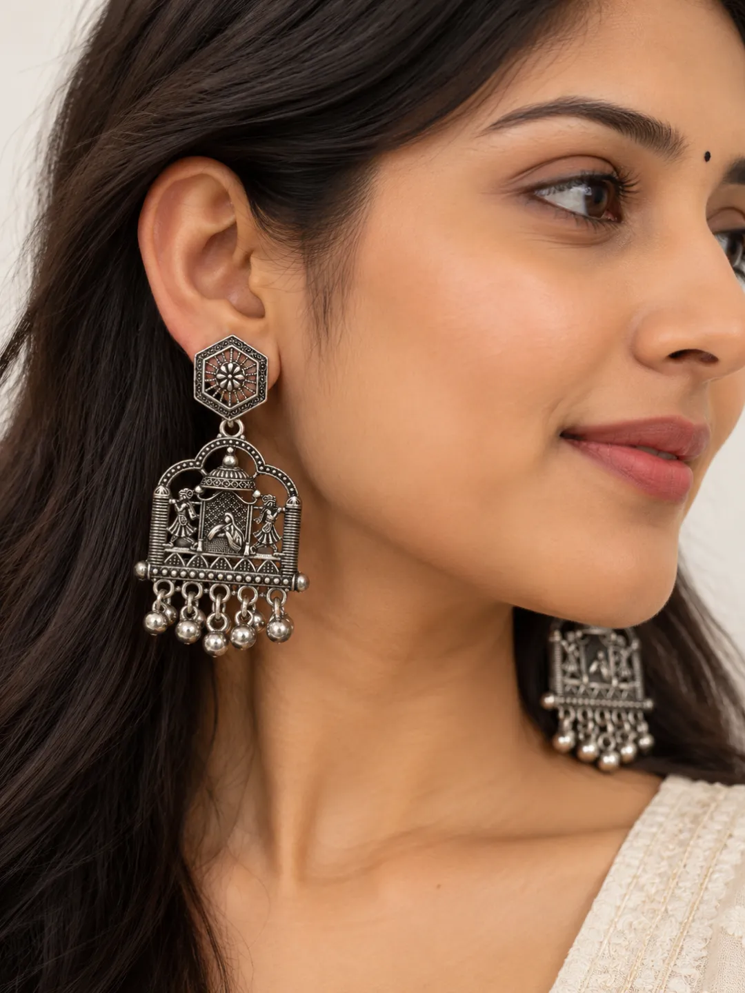 Temple Arch Oxidised Earrings — worn by a model