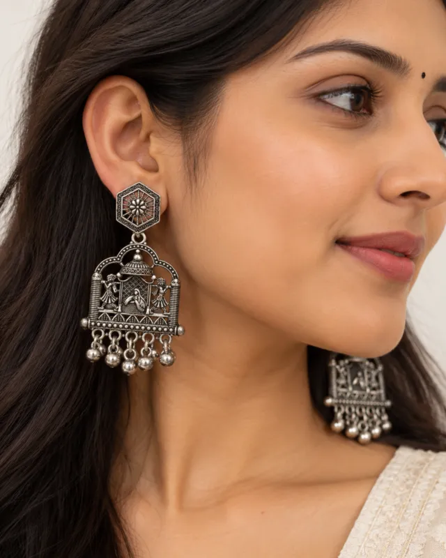 Temple Arch Oxidised Earrings — worn by a model