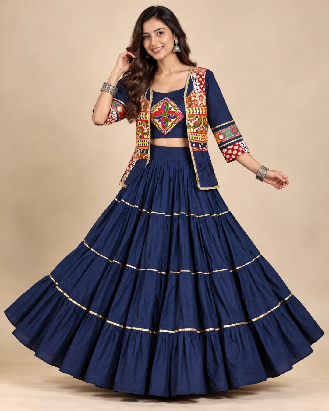 Navy Tiered Lehenga with Embroidered Jacket — front view of the jacket and tiered skirt