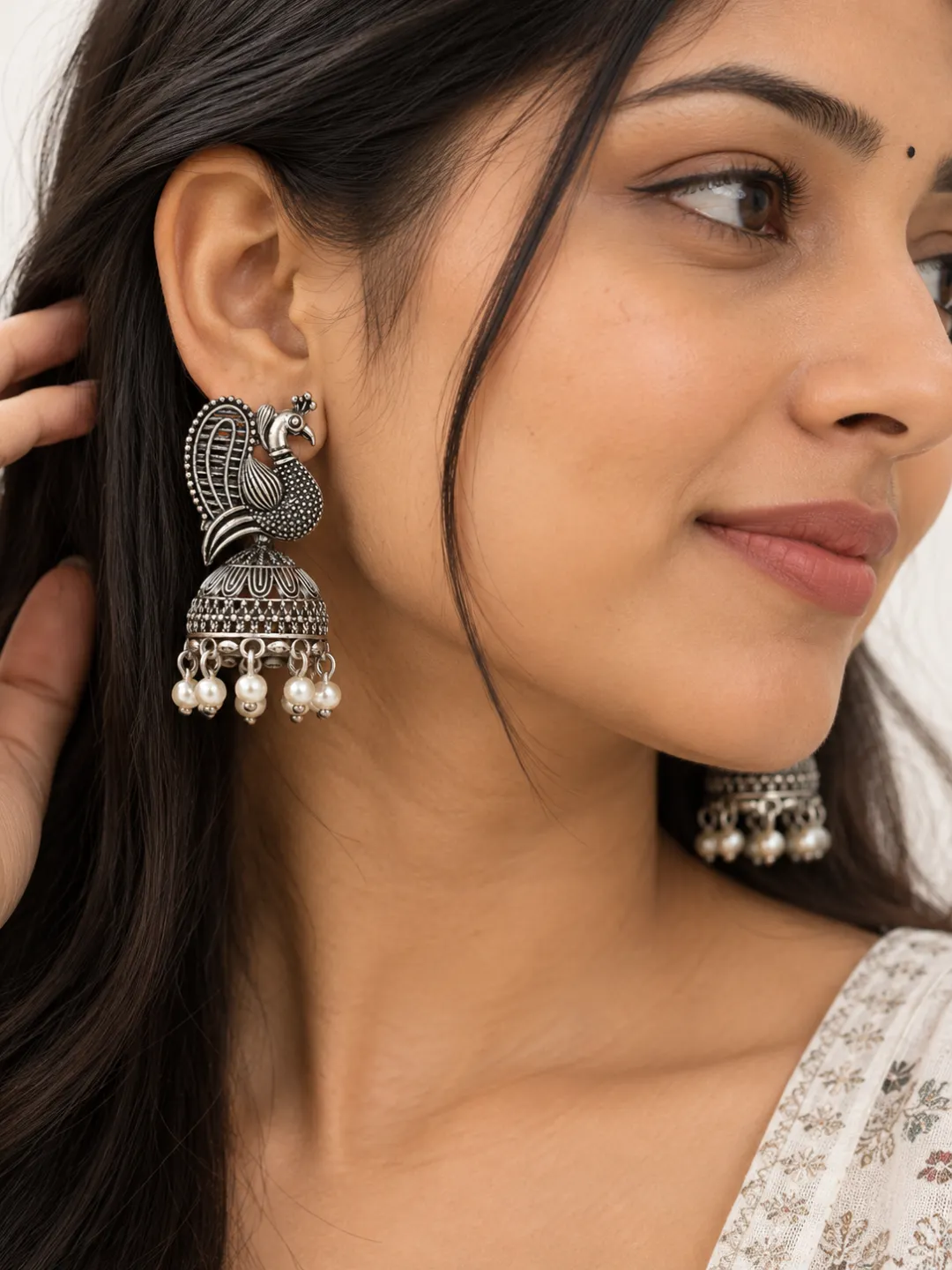 Peacock Jhumka with Pearl Drops — worn by a model