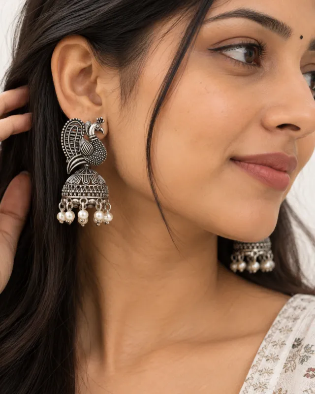 Peacock Jhumka with Pearl Drops — worn by a model