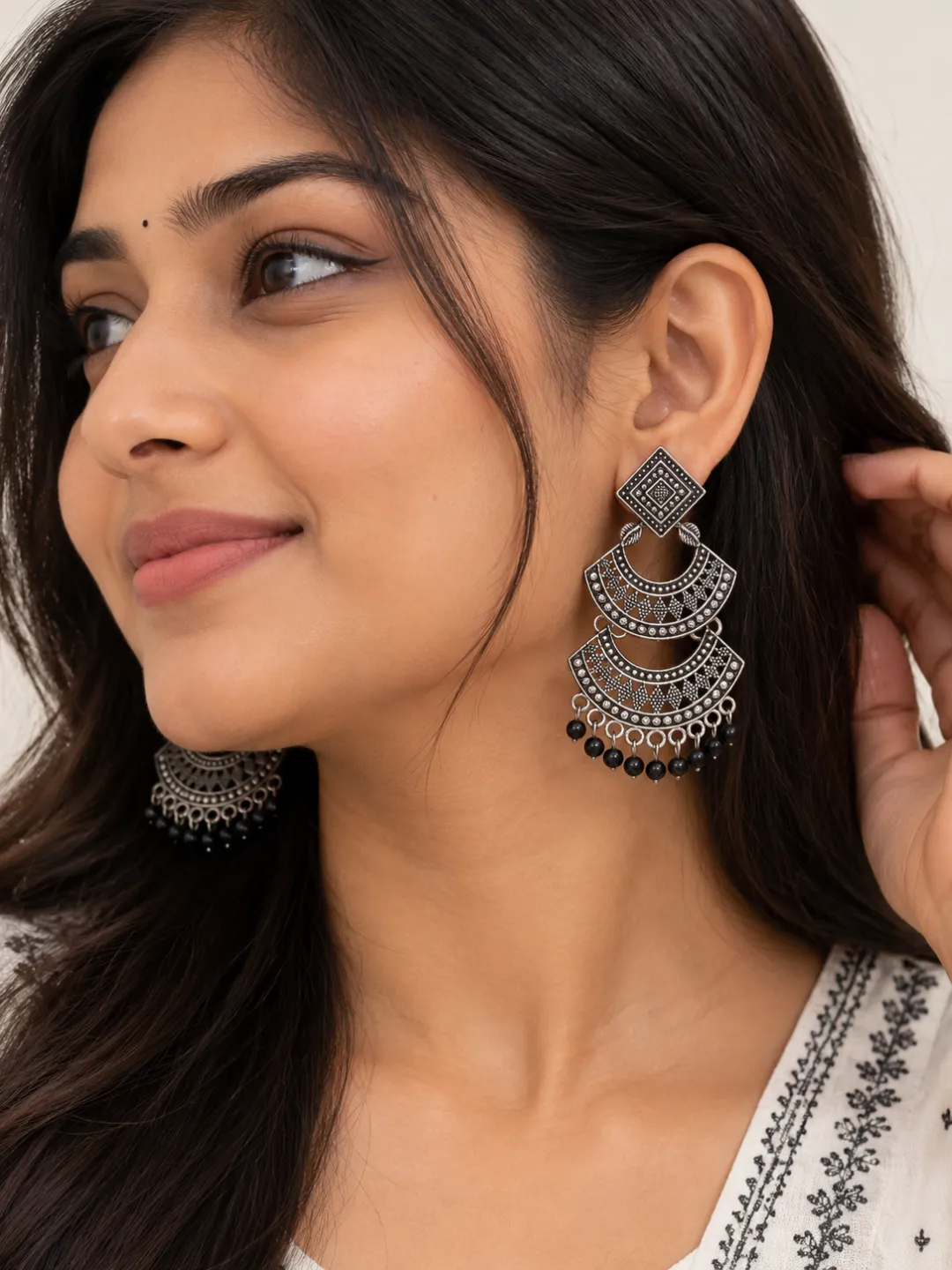 Chandbali Earrings with Black Beads — worn by a model