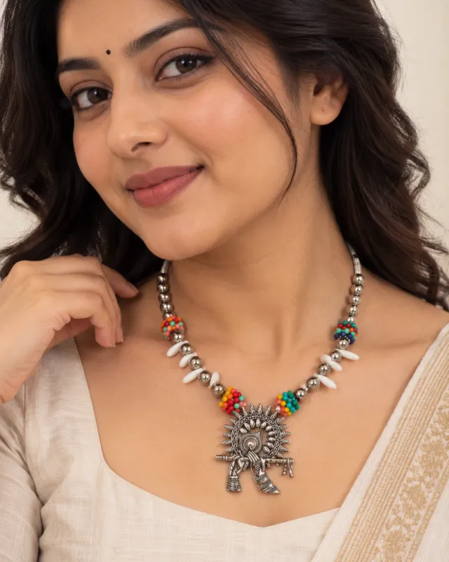 Cowrie Shell Tribal Pendant Necklace — worn by a model