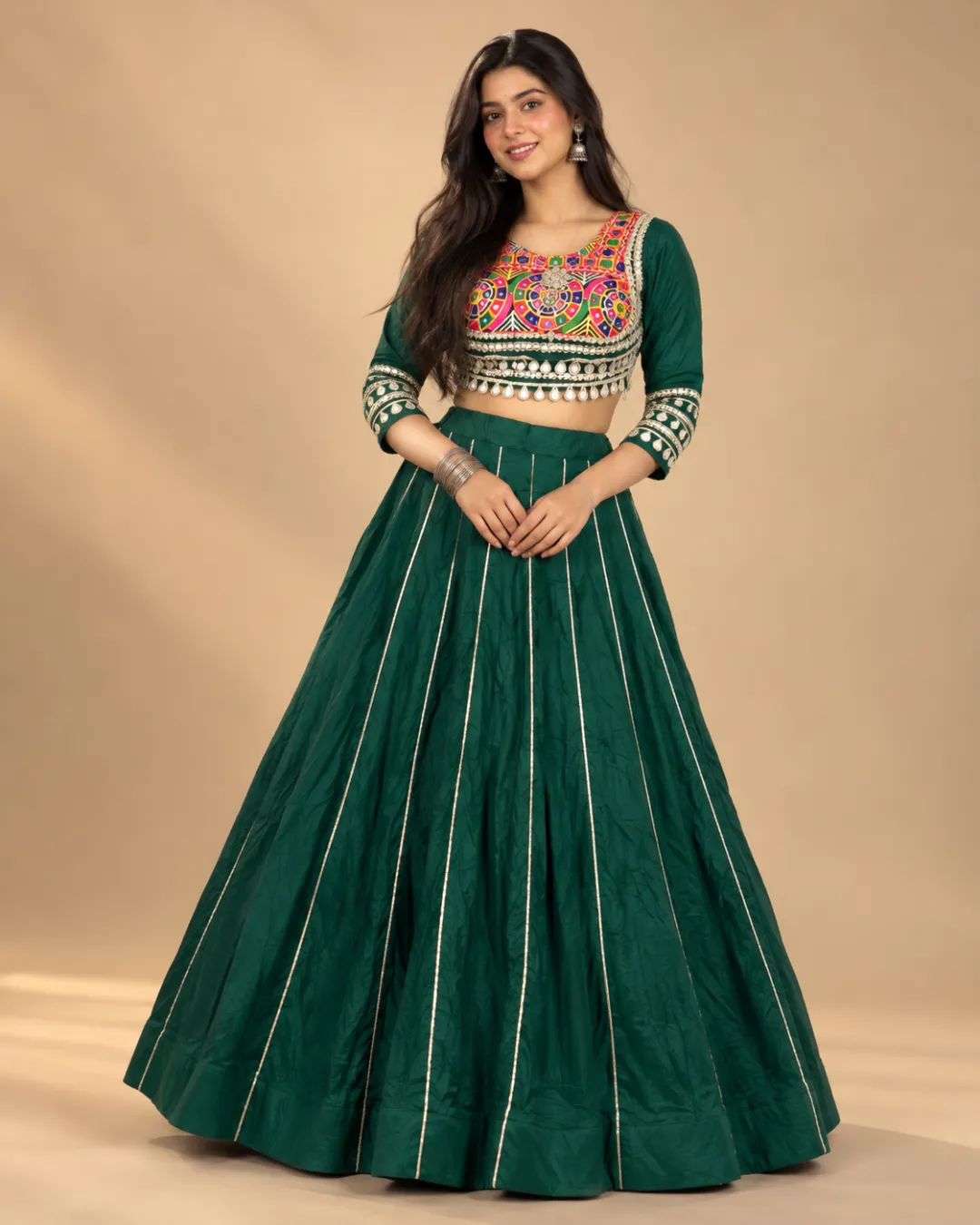 Emerald Green Panelled Lehenga with Embroidered Choli — front view of the panelled skirt and embroidered choli
