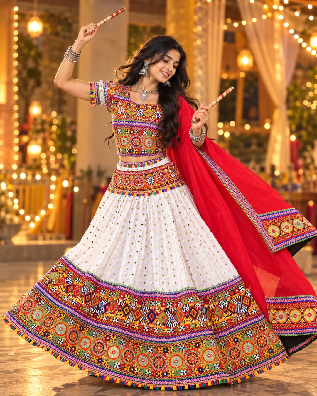 White Sequin Lehenga with Red Dupatta — dancing with dandiya sticks