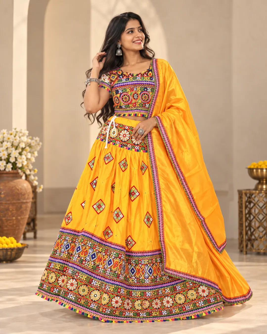 Marigold Yellow Mirror Work Chaniya Choli — three-quarter view
