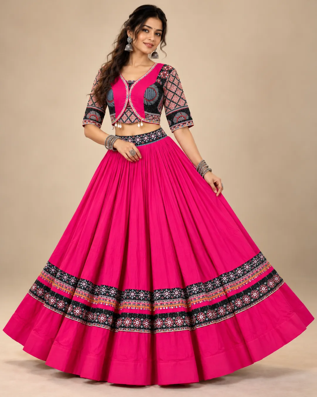 Fuchsia Gathered Lehenga with Black Border and Jacket — skirt held open to show the black printed hem bands