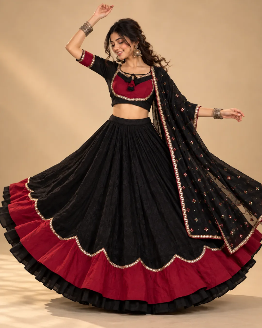 Black & Maroon Scalloped Lehenga with Embroidered Dupatta — mid-turn with all three layers showing