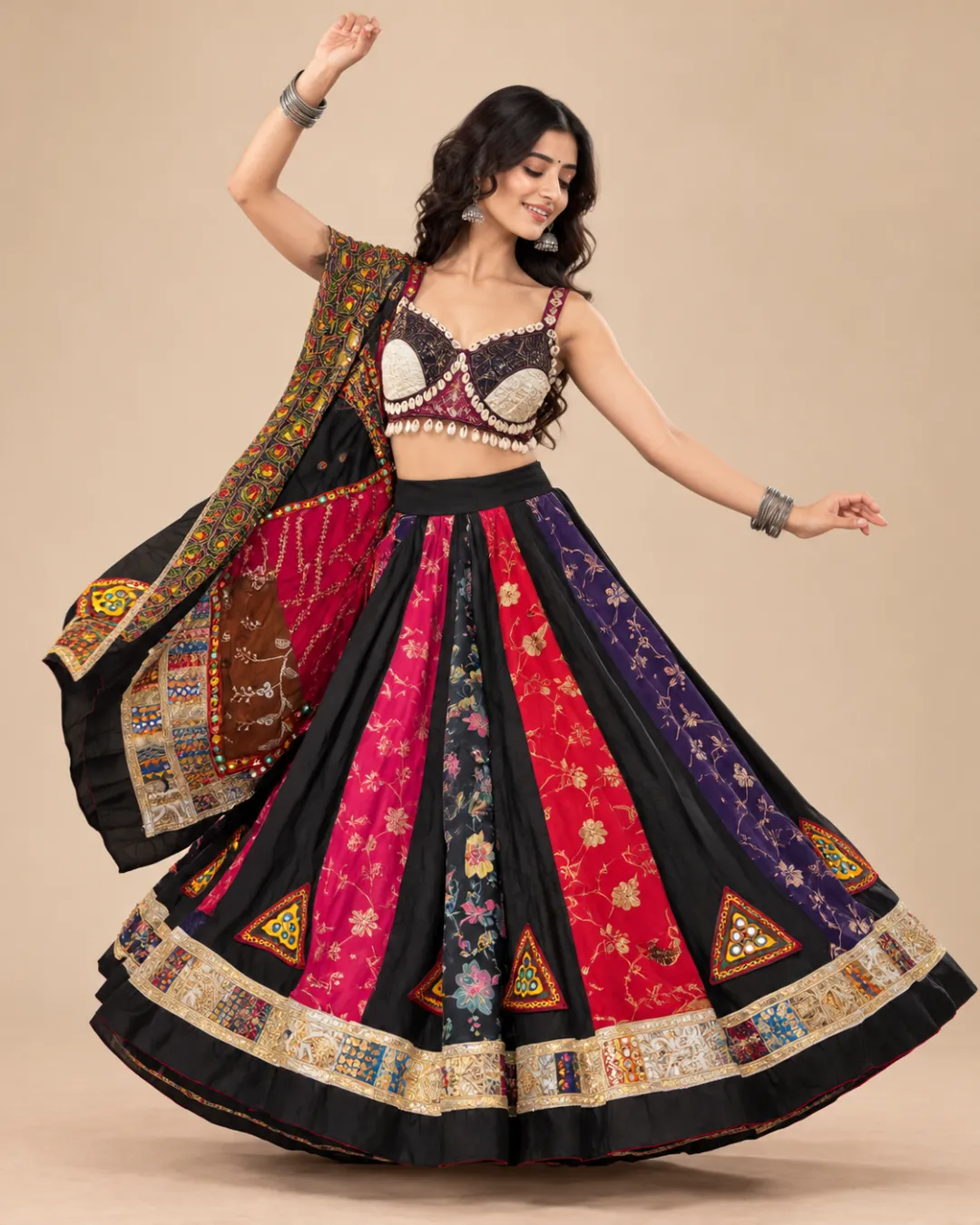 Black & Magenta Patchwork Lehenga with Mirror Border — mid-turn with the patchwork panels open