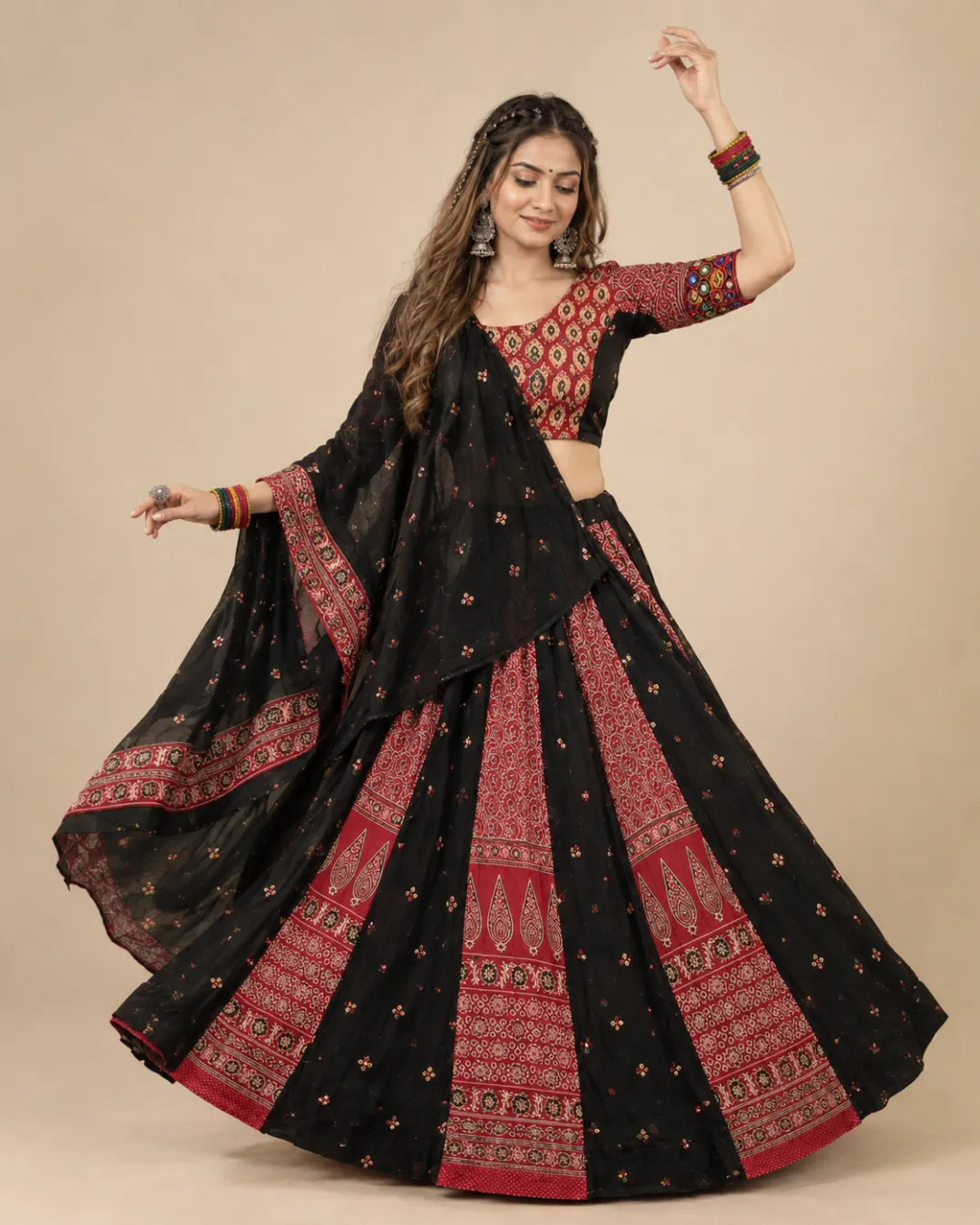 Black & Red Printed Panelled Lehenga with Embroidered Dupatta — mid-turn with the panels opening out