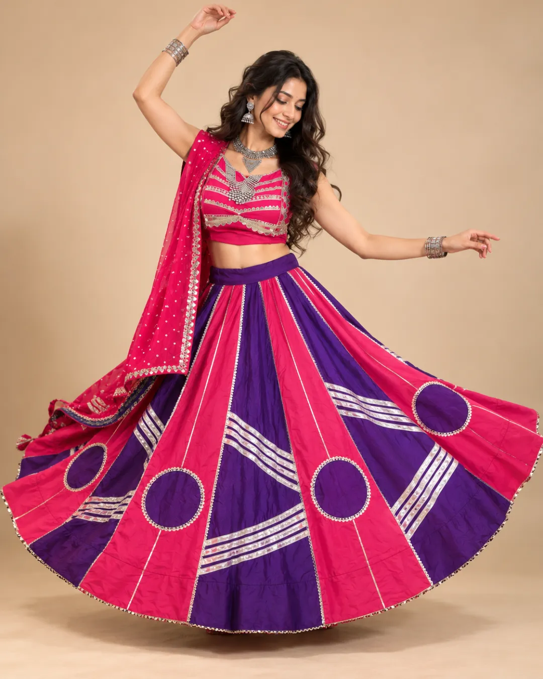 Fuchsia & Purple Panelled Lehenga with Silver Gota Work — mid-turn with the circles opening out