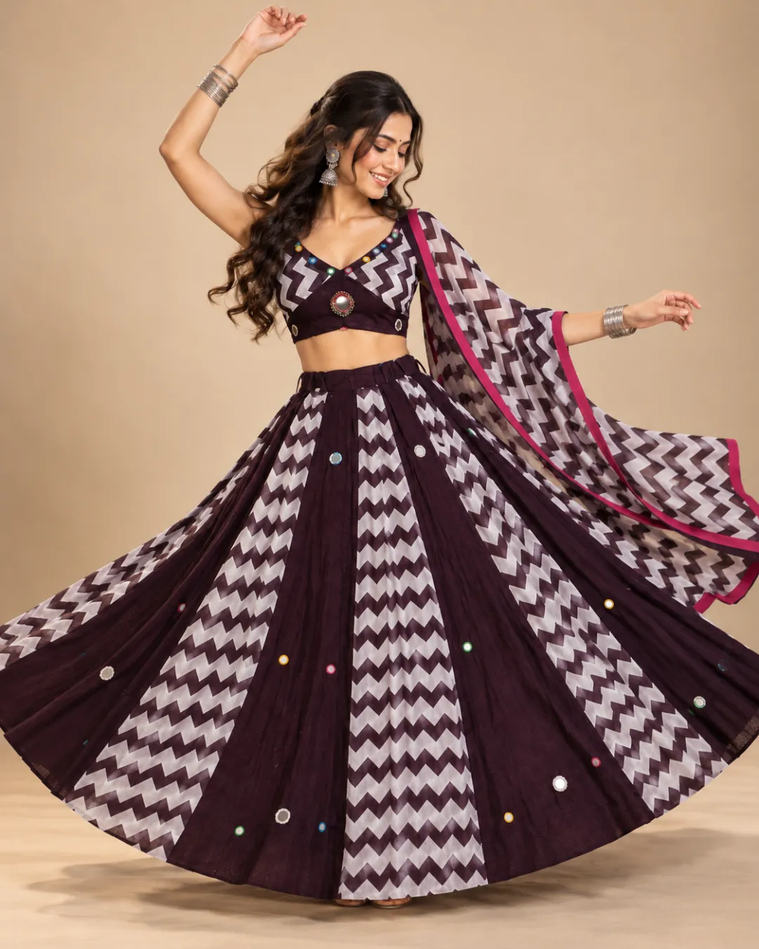 Plum Chevron Print Lehenga with Mirror Accents — mid-turn with the skirt open