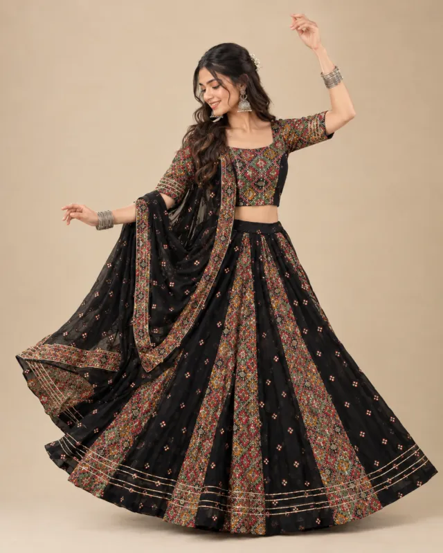 Black & Patola Print Panelled Lehenga — mid-turn with the printed panels open