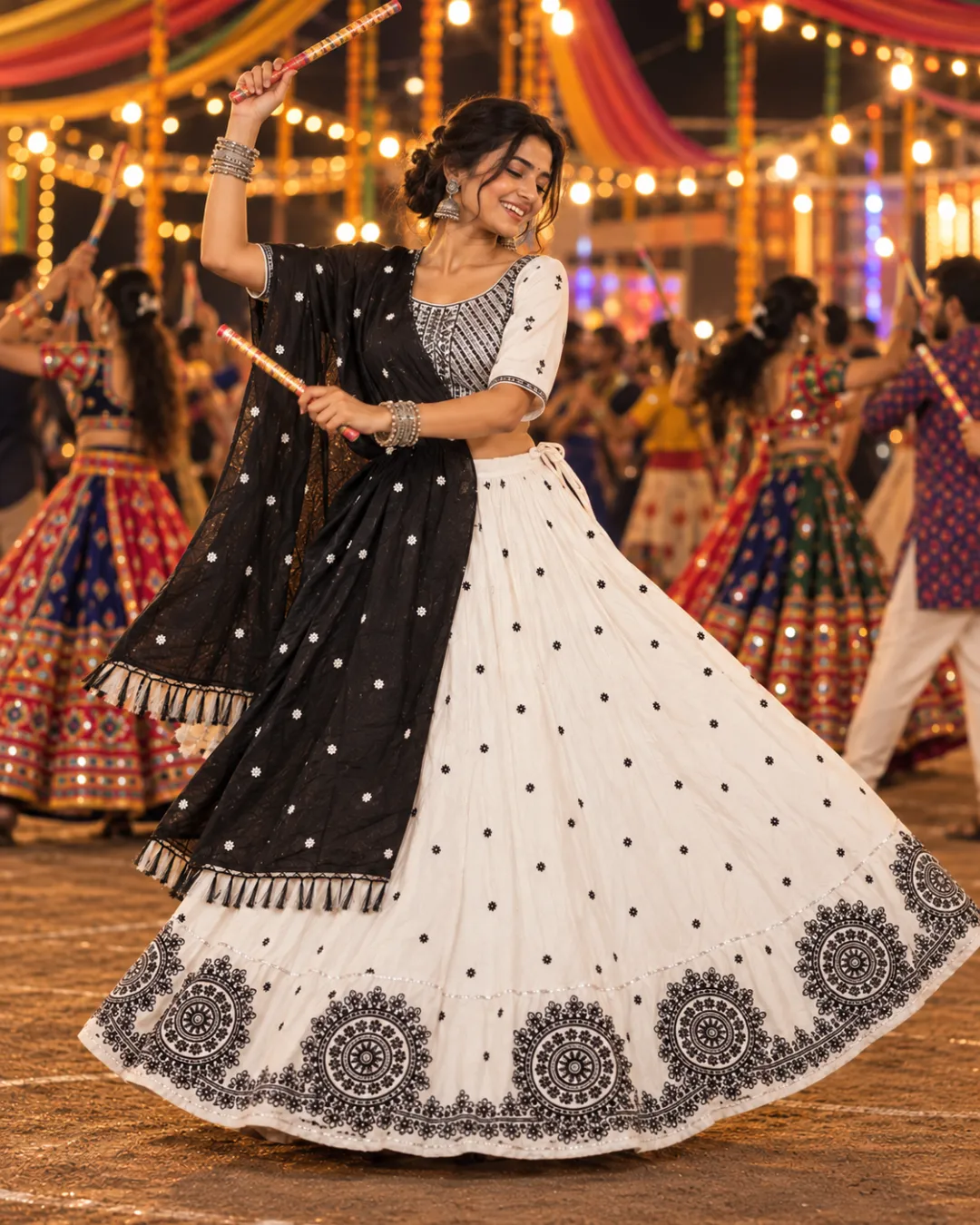 Ivory & Black Mandala Print Chaniya Choli — dancing with dandiya sticks
