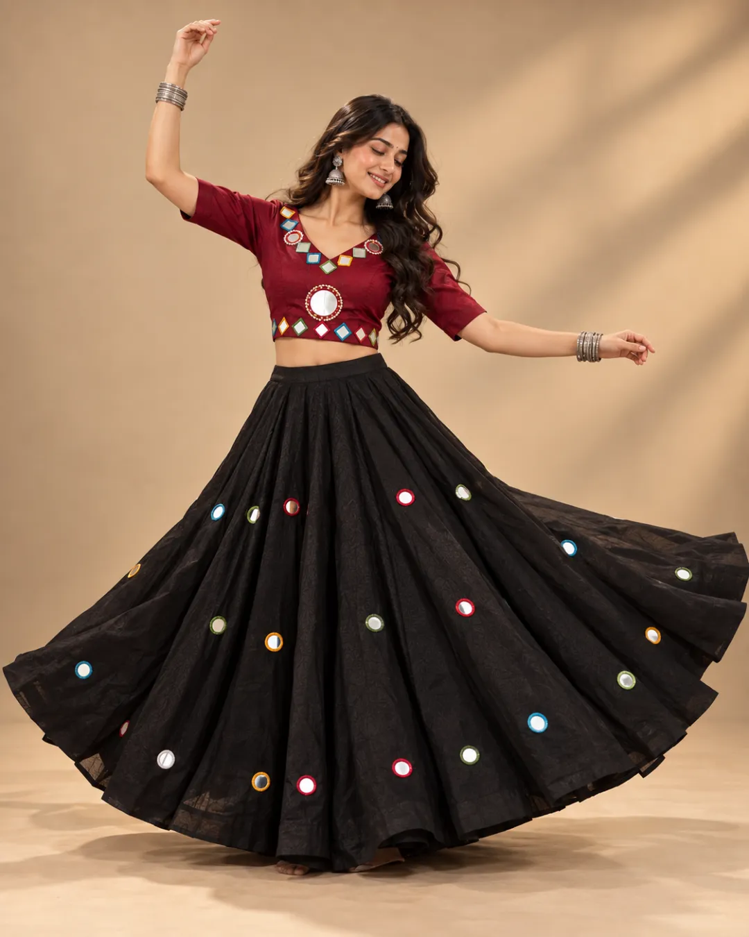 Black Mirror Work Lehenga with Maroon Choli — mid-turn with the mirrors catching the light