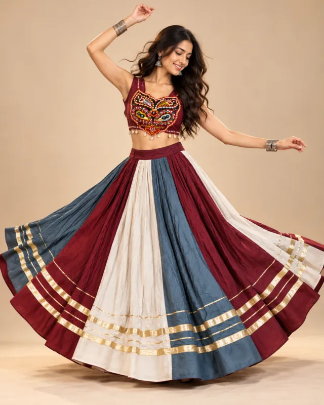 Maroon, Ivory & Blue Panelled Lehenga with Embroidered Choli — mid-turn with the gota bands showing