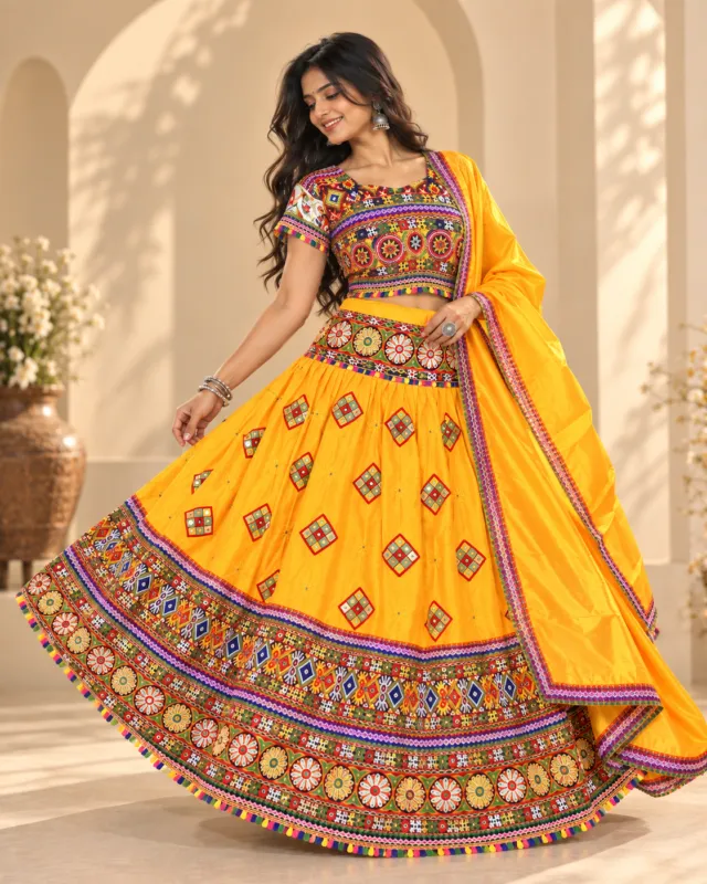 Marigold Yellow Mirror Work Chaniya Choli — skirt spread in a twirl