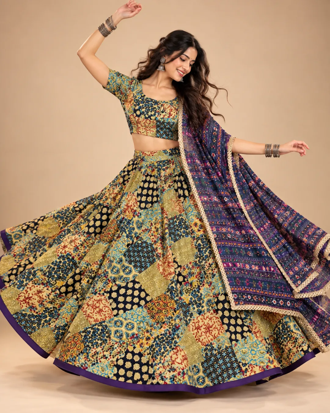 Gold & Teal Patchwork Print Lehenga with Purple Dupatta — mid-turn with the dupatta flying