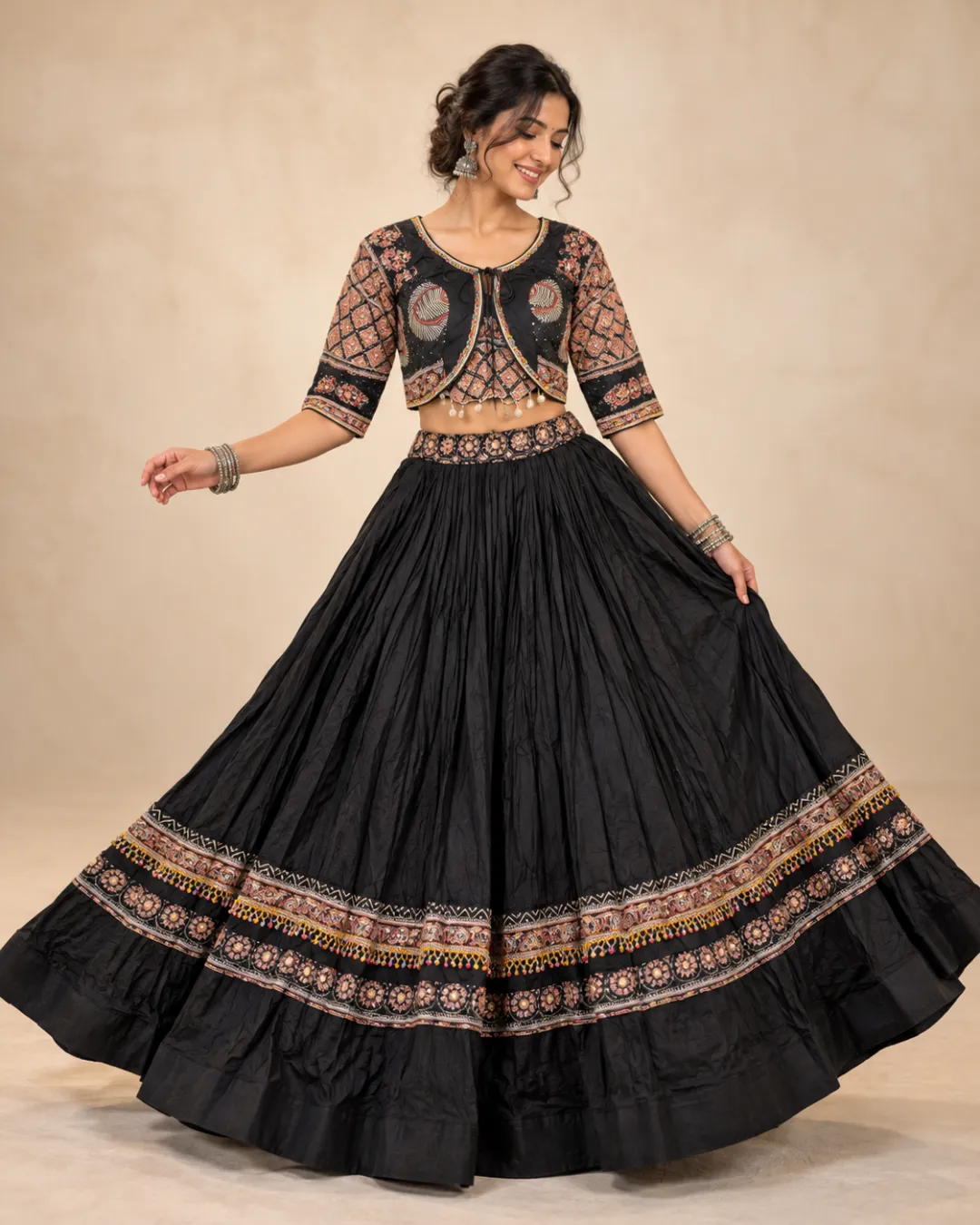 Black Gathered Lehenga with Printed Border and Jacket — mid-turn with the skirt open