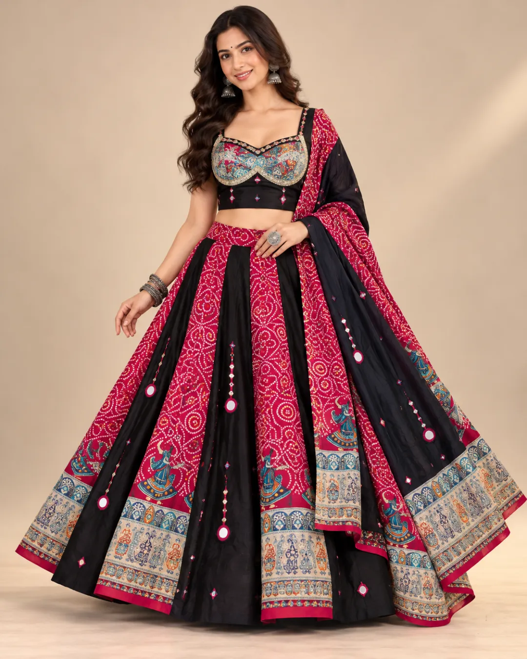 Rani Pink Bandhani Lehenga with Folk Figure Border — front view with the black dupatta