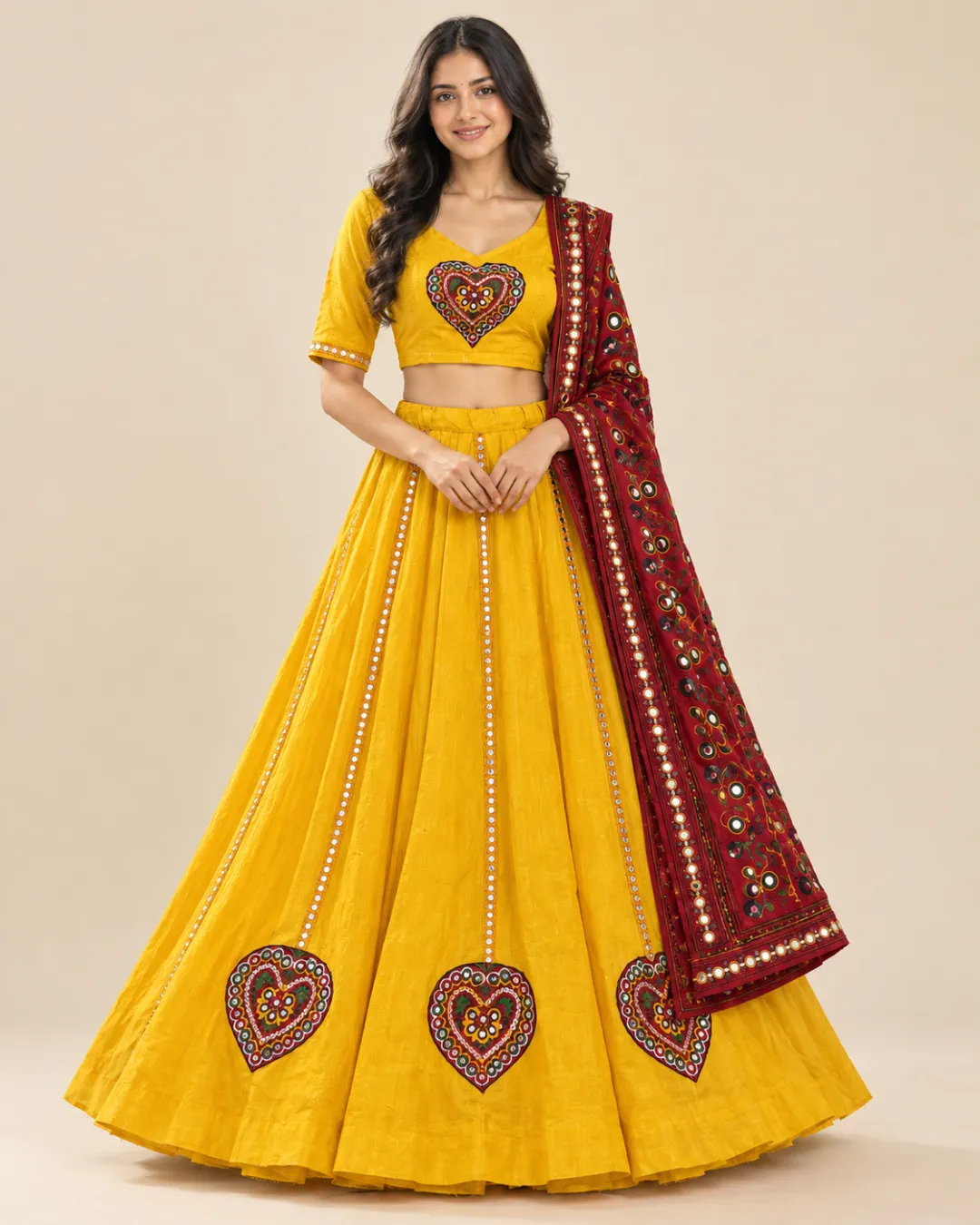 Marigold Yellow Lehenga with Heart Mirror Motifs — front view of the mirror lines and maroon dupatta