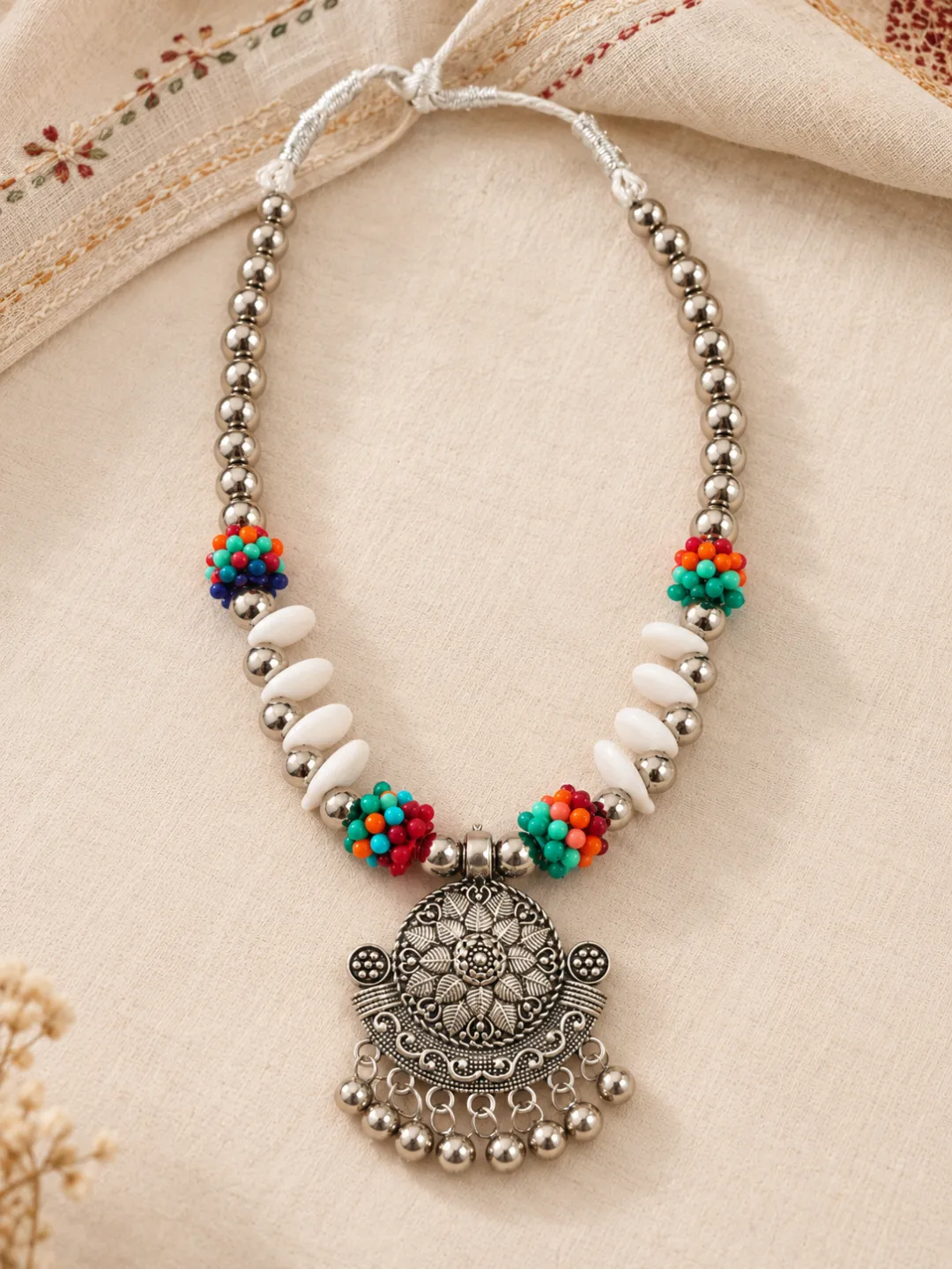 Cowrie and Turquoise Bead Necklace — flat lay with the adjustable cord