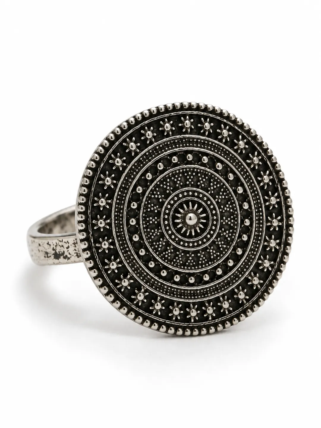 Engraved Mandala Disc Ring — angled view of the disc