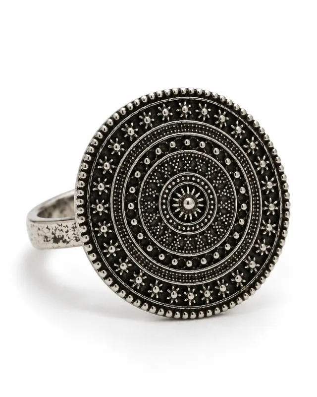 Engraved Mandala Disc Ring — angled view of the disc