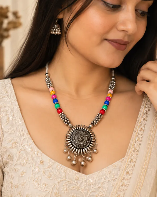 Sunburst Pendant Bead Necklace — worn by a model
