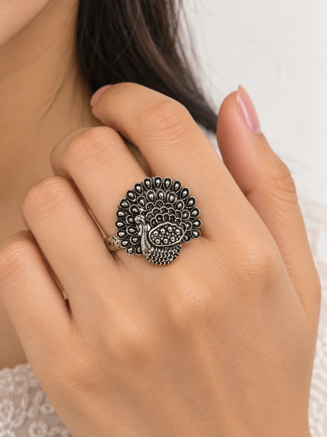 Peacock Statement Ring — worn on the hand