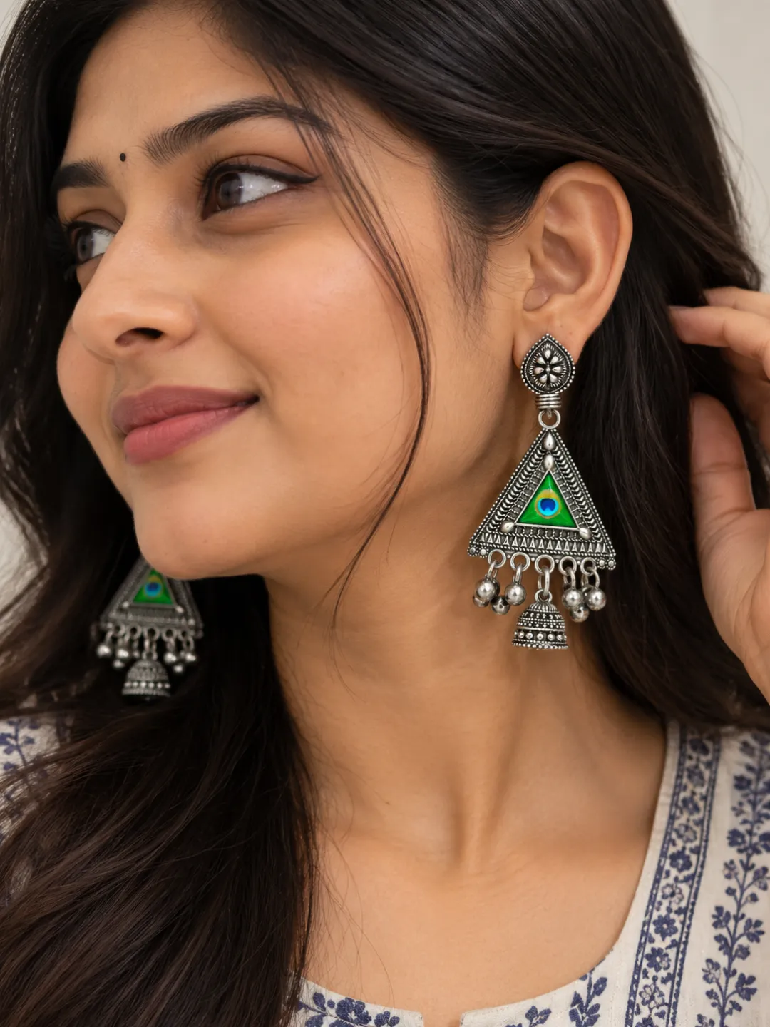 Green Peacock Eye Triangle Jhumkas — worn by a model