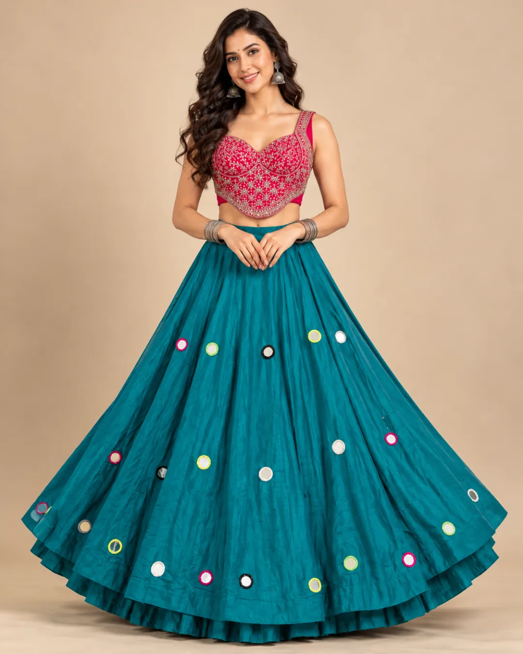 Teal Mirror Work Lehenga with Pink Embroidered Choli — front view of the teal skirt and pink choli