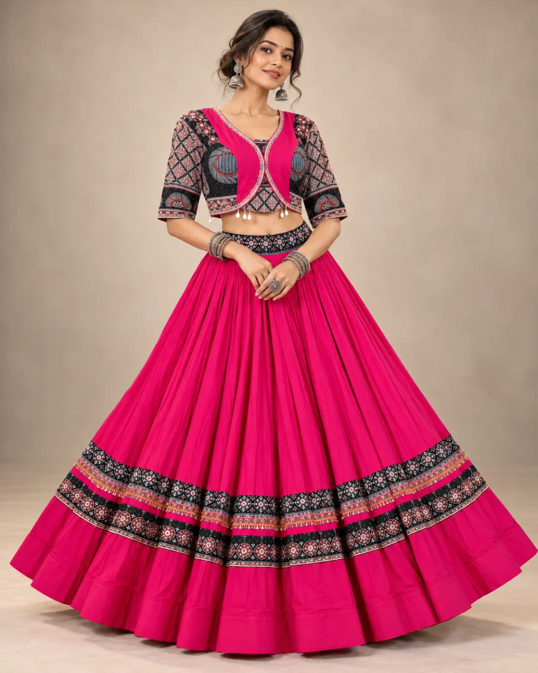 Fuchsia Gathered Lehenga with Black Border and Jacket — side view of the jacket and printed choli