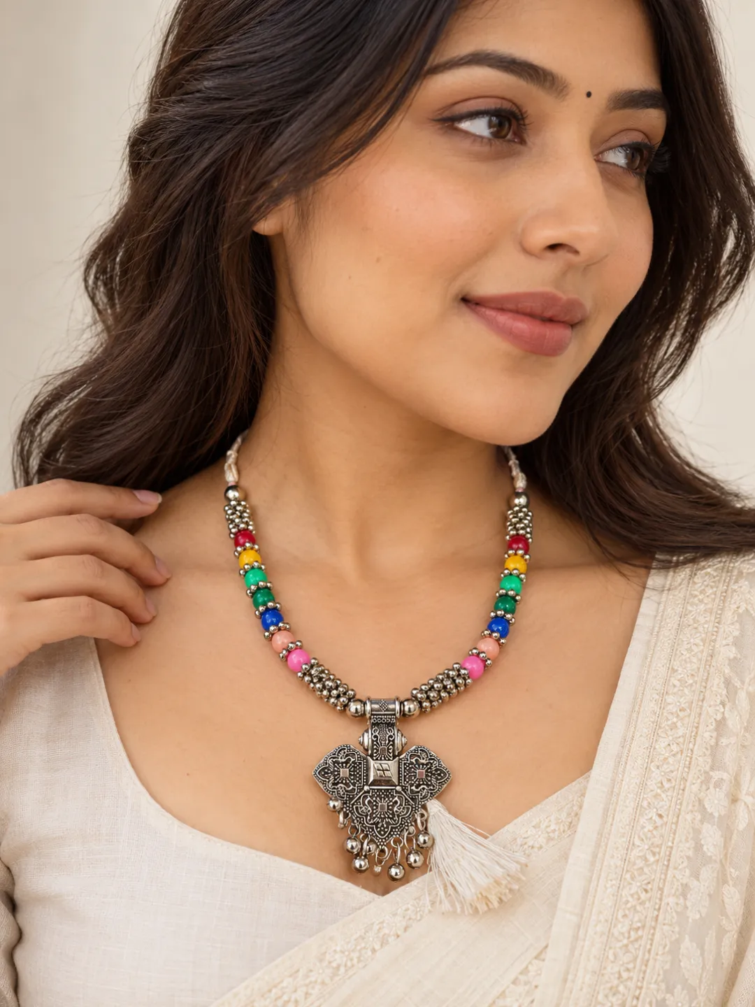 Elephant Pendant Bead Necklace — close-up on the neckline