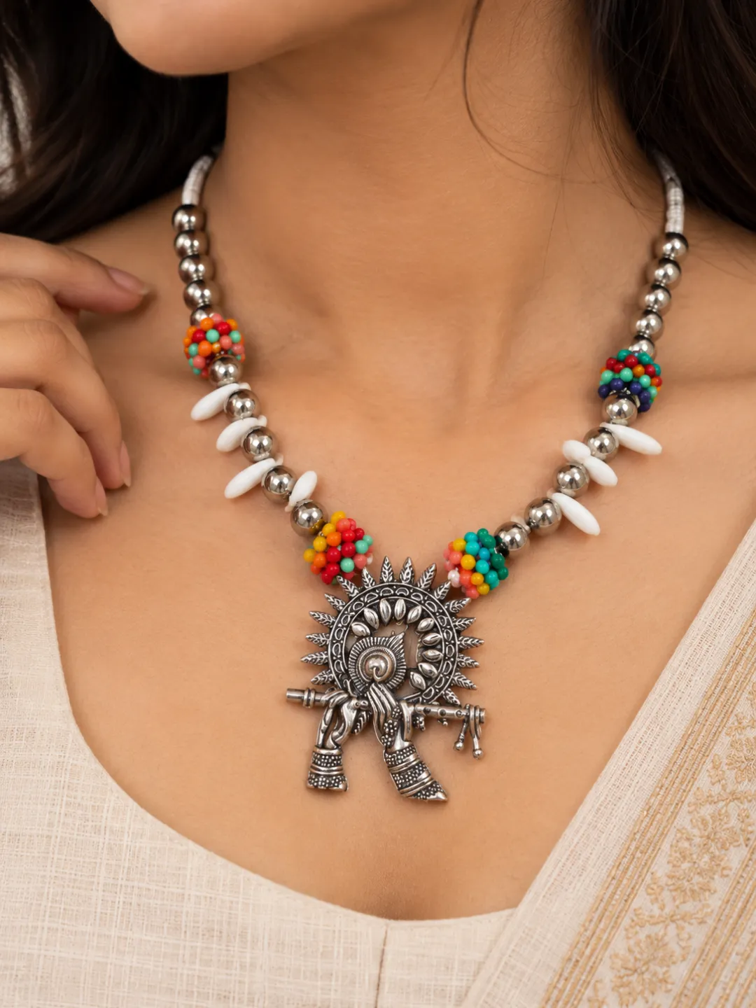 Cowrie Shell Tribal Pendant Necklace — close-up on the neckline